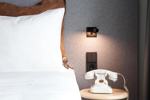 Imagen de la habitación del Hotel Moxy Vienna City East. Foto 17