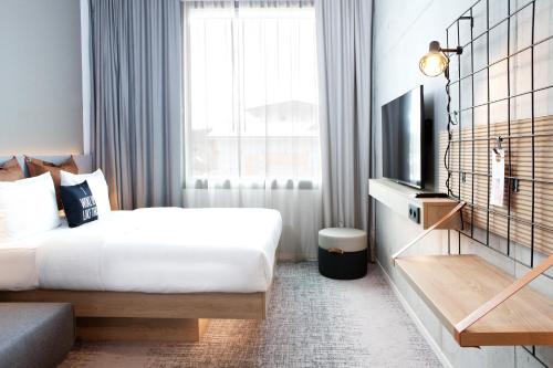 Imagen de la habitación del Hotel Moxy Vienna City East. Foto 18