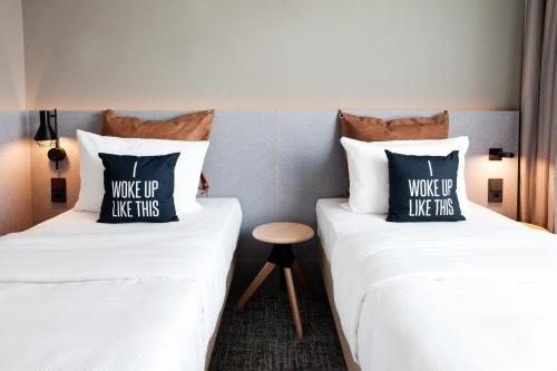 Imagen de la habitación del Hotel Moxy Vienna City East. Foto 19