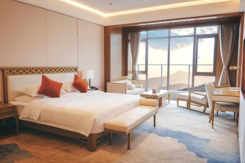 Imagen de la habitación del Hotel Moyun. Foto 17