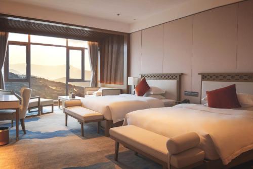 Imagen de la habitación del Hotel Moyun. Foto 18