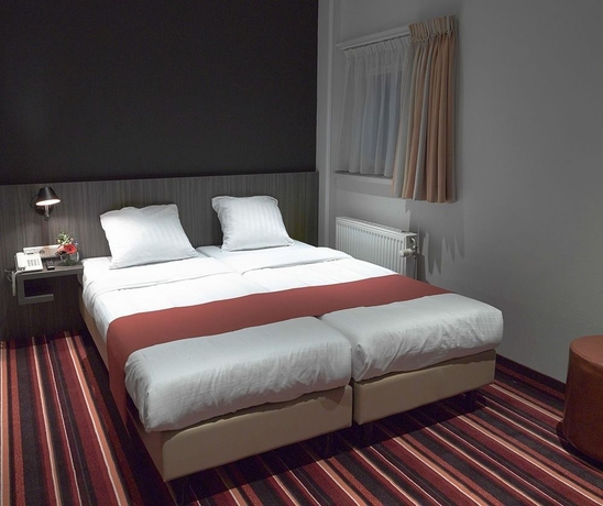 Imagen de la habitación del Hotel Mozart, Ámsterdam. Foto 10