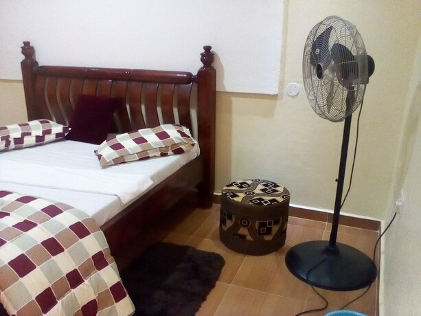 Imagen de la habitación del Hotel Mparo Guest Apartments. Foto 11