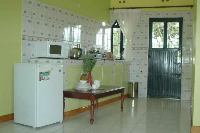 Imagen de la habitación del Hotel Mpeta House. Foto 17