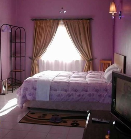 Imagen de la habitación del Hotel Mpeta House. Foto 20