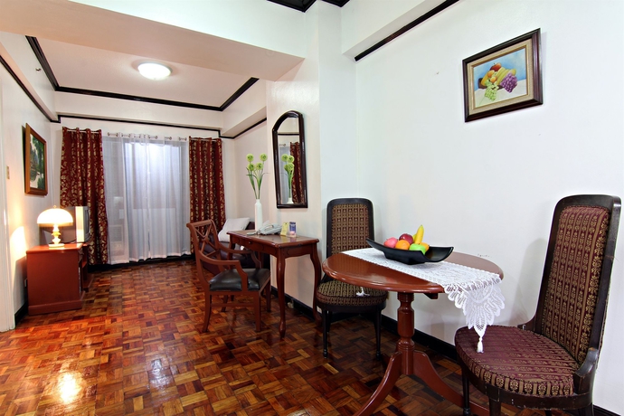 Imagen de la habitación del Hotel Mpt Suites. Foto 2