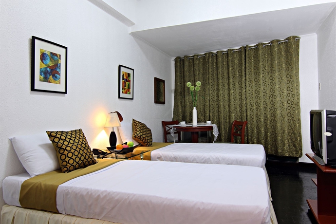 Imagen de la habitación del Hotel Mpt Suites. Foto 4