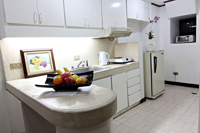 Imagen de la habitación del Hotel Mpt Suites. Foto 7