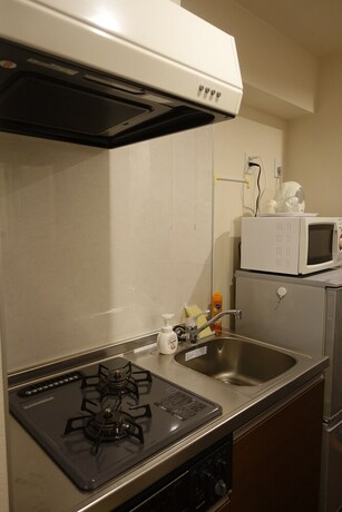 Imagen de la habitación del Hotel Mr. Kinjo Satomo In Ginowan. Foto 23