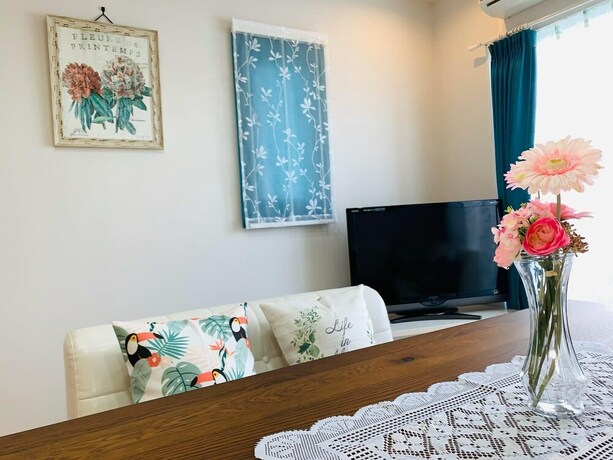 Imagen de la habitación del Hotel Mr. Kinjo Satomo In Ginowan. Foto 26