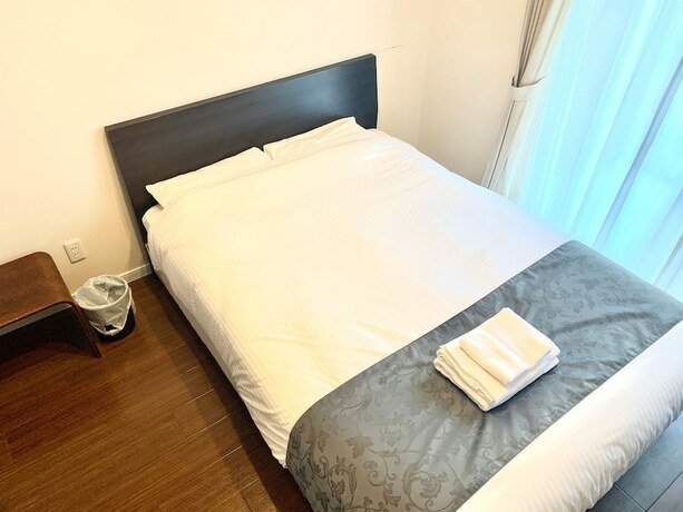 Imagen de la habitación del Hotel Mr. Kinjo Satomo In Ginowan. Foto 27