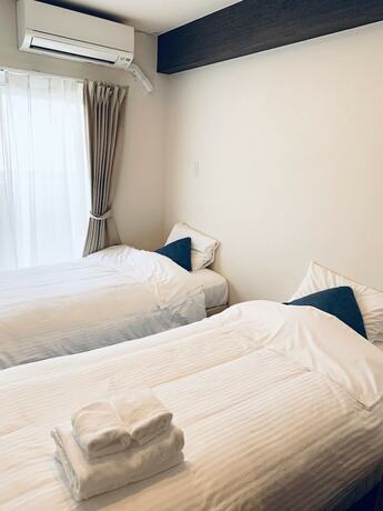 Imagen de la habitación del Hotel Mr. Kinjo Satomo In Ginowan. Foto 29