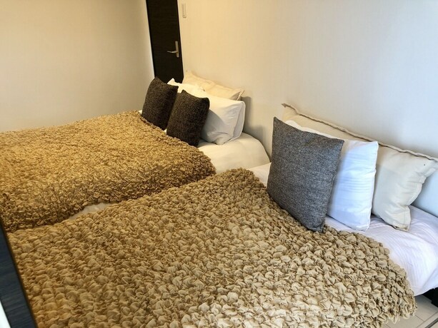 Imagen de la habitación del Hotel Mr. Kintaro Stay Ueno. Foto 33