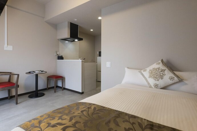 Imagen de la habitación del Hotel Mr.KINJO En ISHIGAKI. Foto 19