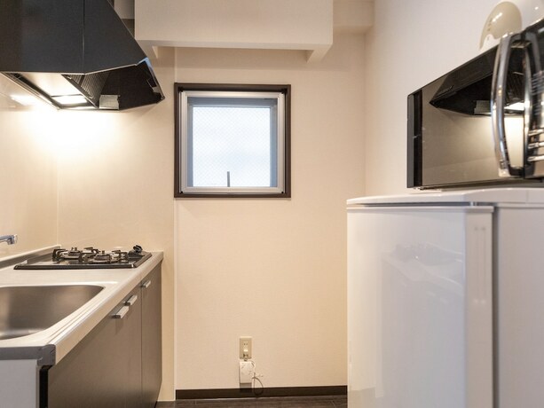 Imagen de la habitación del Hotel Mr.KINJO IN UENOKURA. Foto 12