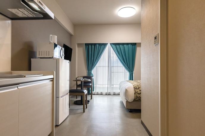 Imagen de la habitación del Hotel Mr.KINJO LINK in Kugai Miyakojima. Foto 13
