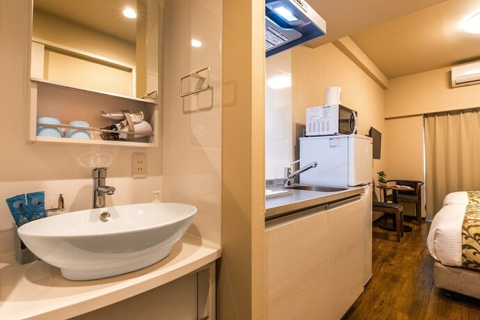 Imagen de la habitación del Hotel Mr.KINJO LINK in Kume NAHA. Foto 12