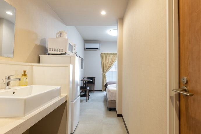 Imagen de la habitación del Hotel Mr.KINJO Miyakojima Aparagi Resort 1. Foto 10