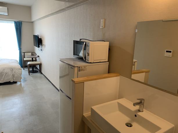 Imagen de la habitación del Hotel Mr.KINJO in Kokusaidori. Foto 7
