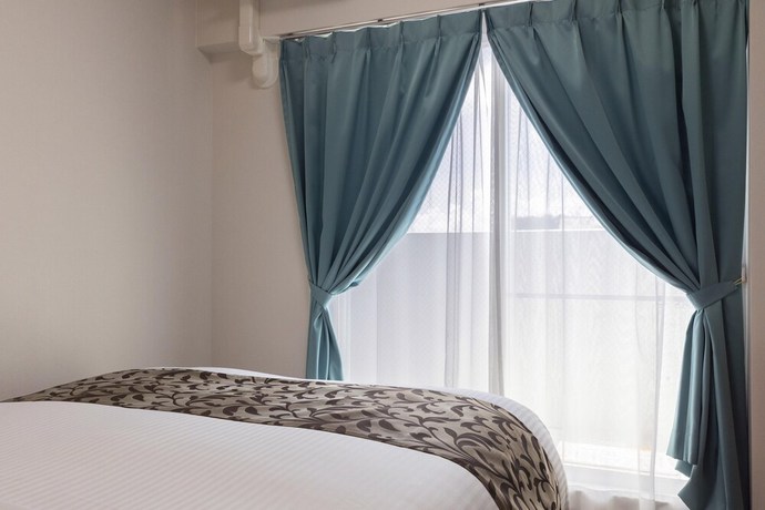Imagen de la habitación del Hotel Mr.KINJO in NISHIZATO MIYAKOJIMA. Foto 11