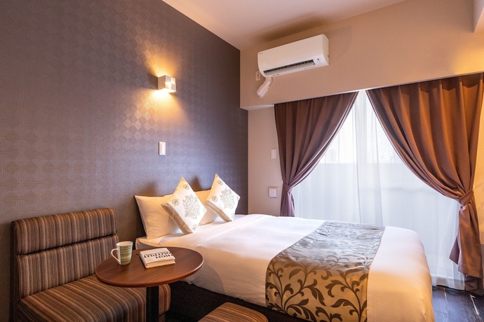 Imagen de la habitación del Hotel Mr.KINJO in SAKAEMACHI. Foto 6