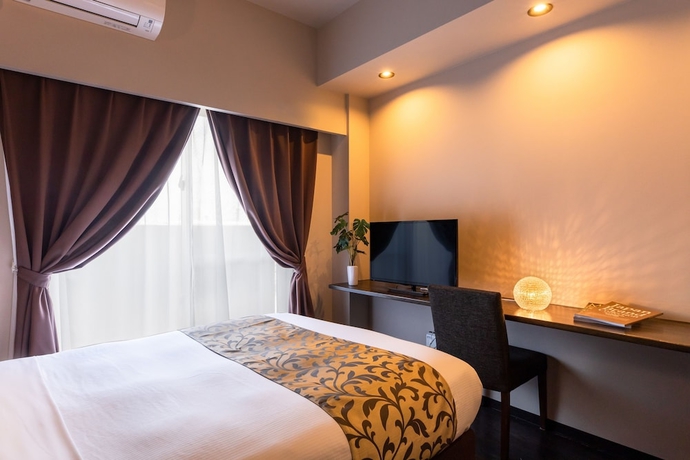 Imagen de la habitación del Hotel Mr.KINJO in SAKAEMACHI. Foto 9