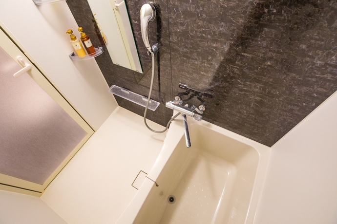 Imagen de la habitación del Hotel Mr.KINJO in SAKAEMACHI. Foto 15
