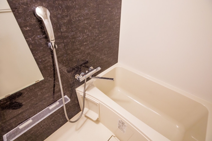 Imagen de la habitación del Hotel Mr.KINJO in SAKAEMACHI. Foto 16