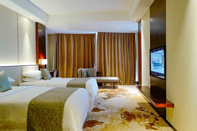 Imagen de la habitación del Hotel Mr.d Linyi. Foto 11