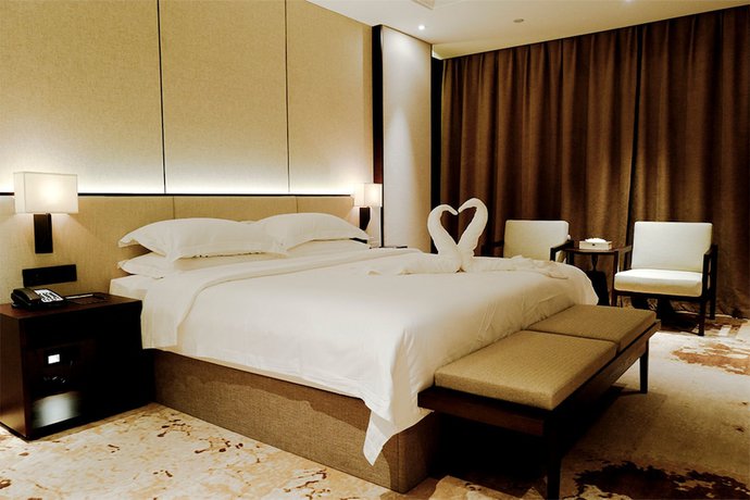 Imagen de la habitación del Hotel Mr.d Linyi. Foto 12