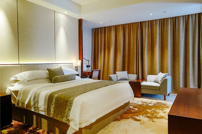 Imagen de la habitación del Hotel Mr.d Linyi. Foto 13
