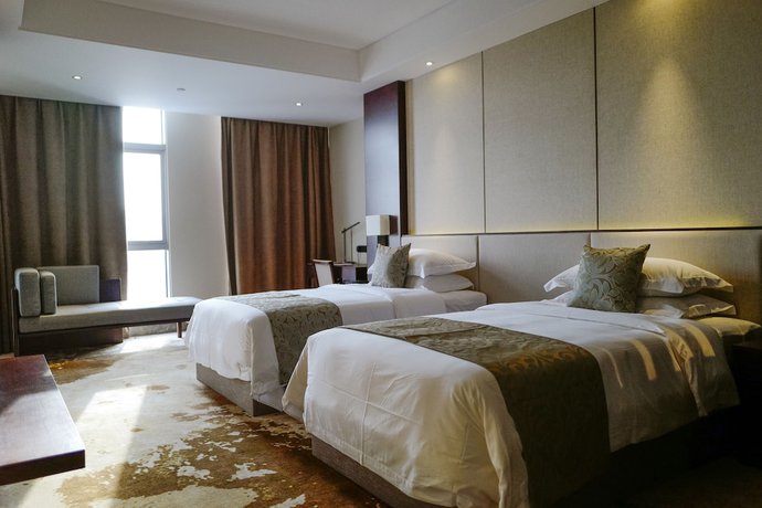 Imagen de la habitación del Hotel Mr.d Linyi. Foto 14
