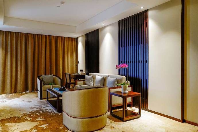 Imagen de la habitación del Hotel Mr.d Linyi. Foto 15