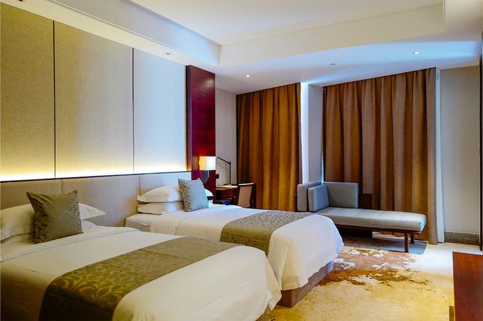 Imagen de la habitación del Hotel Mr.d Linyi. Foto 16