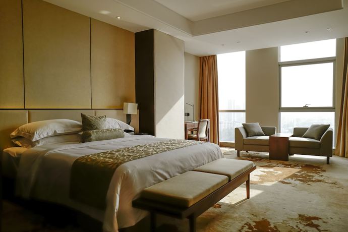 Imagen de la habitación del Hotel Mr.d Linyi. Foto 17