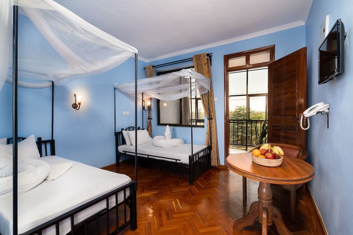 Imagen de la habitación del Hotel Mrimba Palm. Foto 14