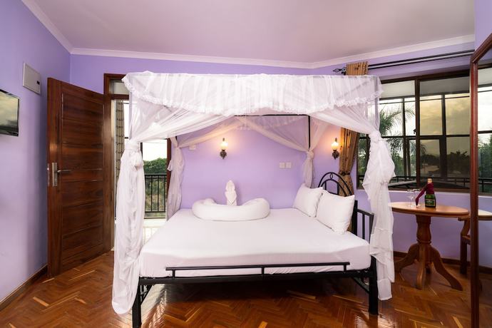 Imagen de la habitación del Hotel Mrimba Palm. Foto 15