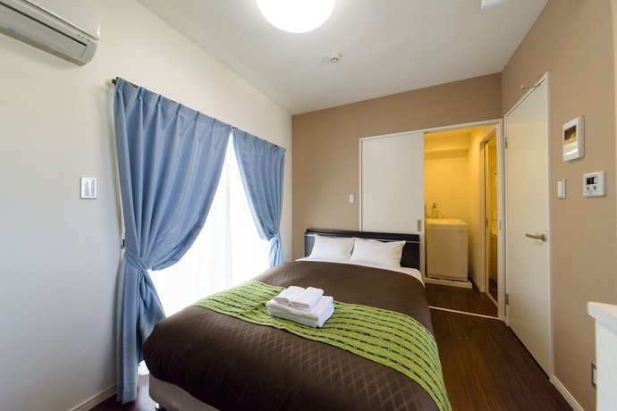 Imagen de la habitación del Hotel Mr.kinjo Eminence Inn Makishi. Foto 4