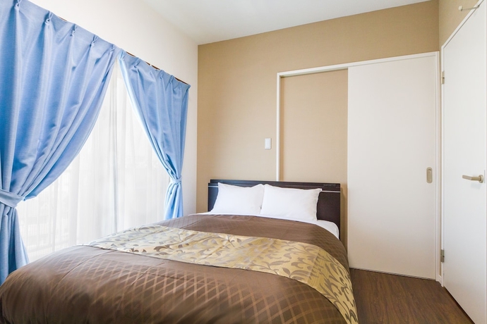 Imagen de la habitación del Hotel Mr.kinjo Eminence Inn Makishi. Foto 7