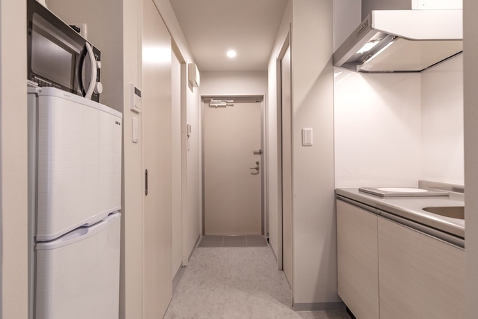 Imagen de la habitación del Hotel Mr.kinjo Eminence Inn Makishi. Foto 9