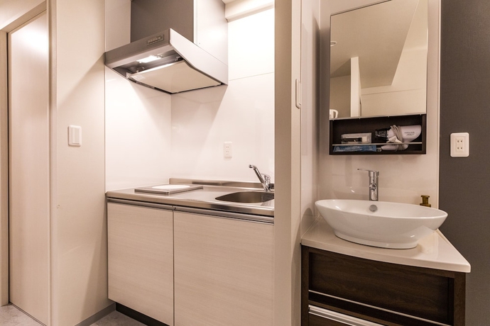 Imagen de la habitación del Hotel Mr.kinjo Eminence Inn Makishi. Foto 13