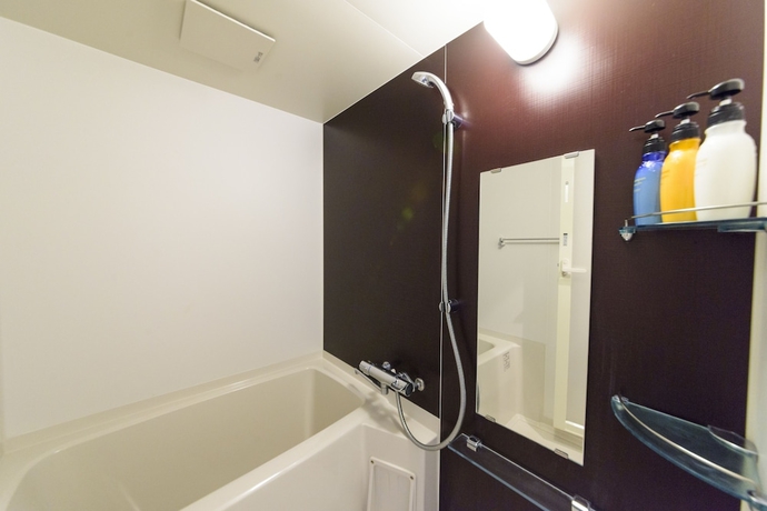 Imagen de la habitación del Hotel Mr.kinjo Eminence Inn Makishi. Foto 17