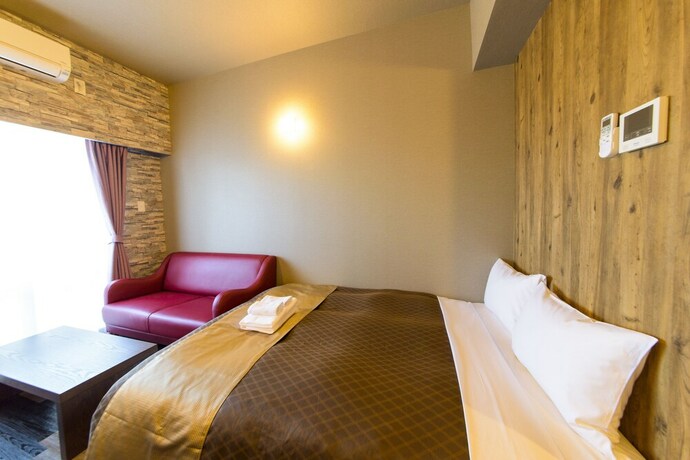 Imagen de la habitación del Hotel Mr.kinjo In Alaha Style. Foto 20