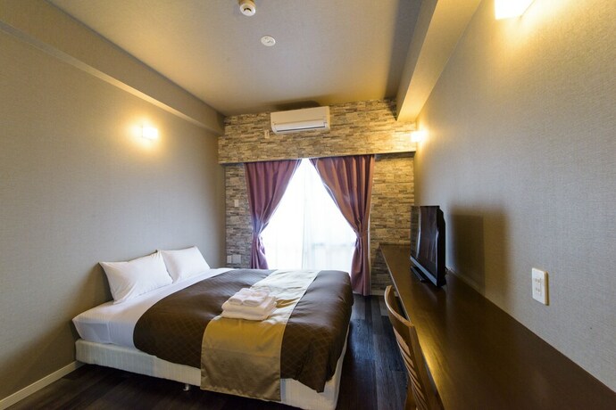 Imagen de la habitación del Hotel Mr.kinjo In Alaha Style. Foto 33