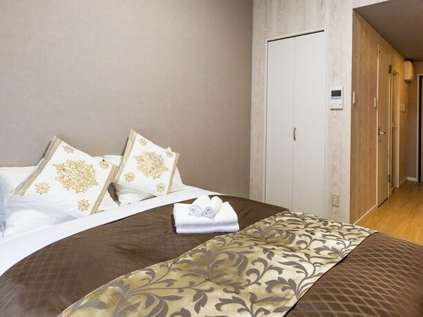 Imagen de la habitación del Hotel Mr.kinjo In Asato. Foto 19