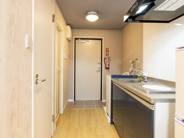 Imagen de la habitación del Hotel Mr.kinjo In Asato. Foto 26