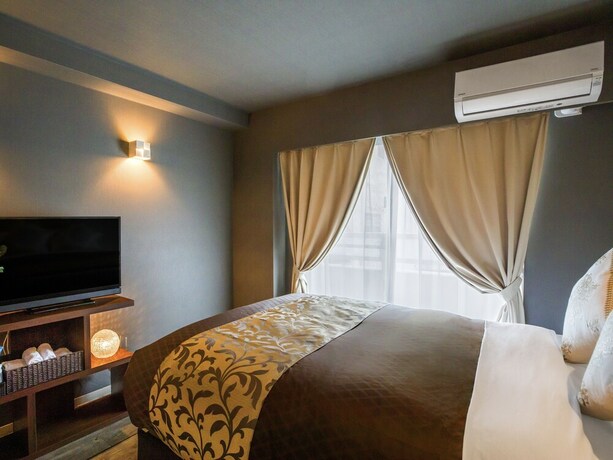 Imagen de la habitación del Hotel Mr.kinjo In Gusuku. Foto 19