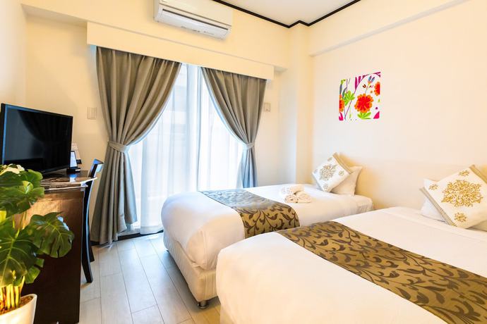 Imagen de la habitación del Hotel Mr.kinjo In Kume. Foto 6