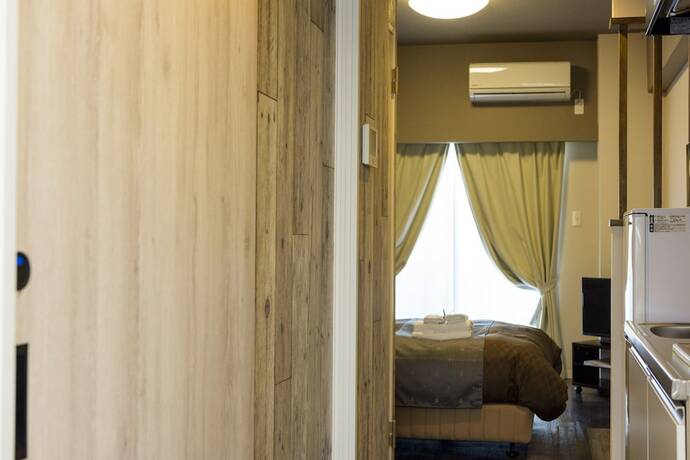 Imagen de la habitación del Hotel Mr.kinjo In Mihara. Foto 23