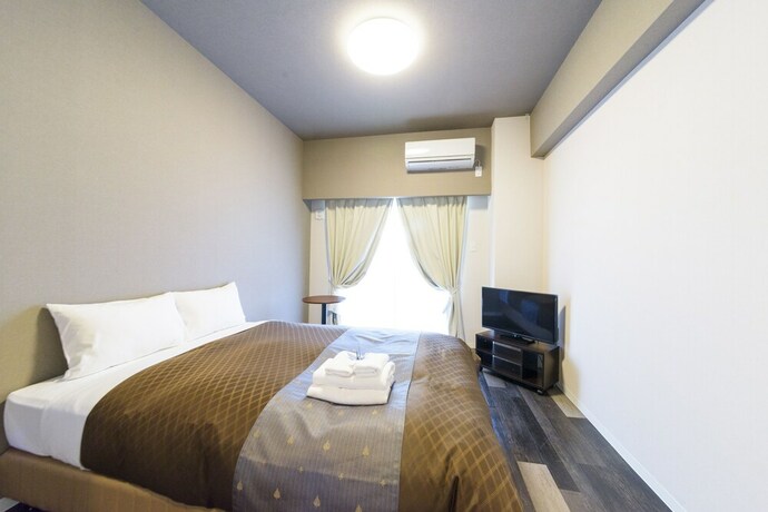 Imagen de la habitación del Hotel Mr.kinjo In Mihara. Foto 34